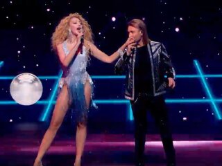 Фото Олі Полякової та Олега Винника